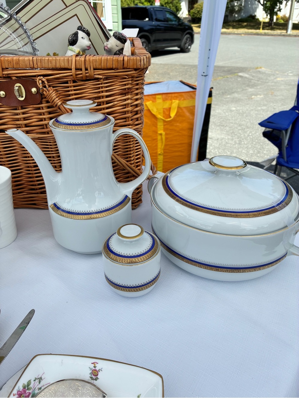 Elegant White Porcelain Serving Set with Blue and Gold Accents